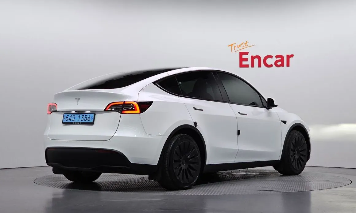 Tesla Model Y — фото 5
