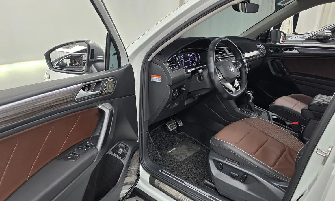 Volkswagen Tiguan — фото 7