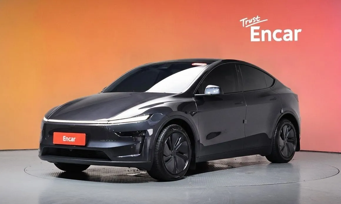 Tesla Model Y — фото 1