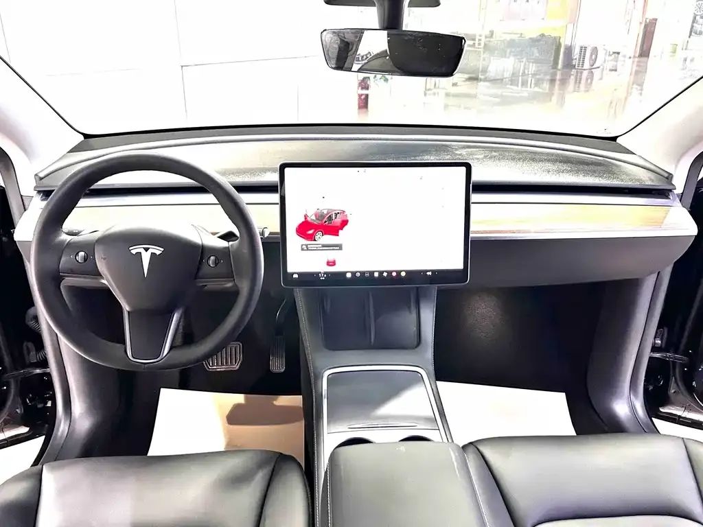 Tesla Model Y — фото 6