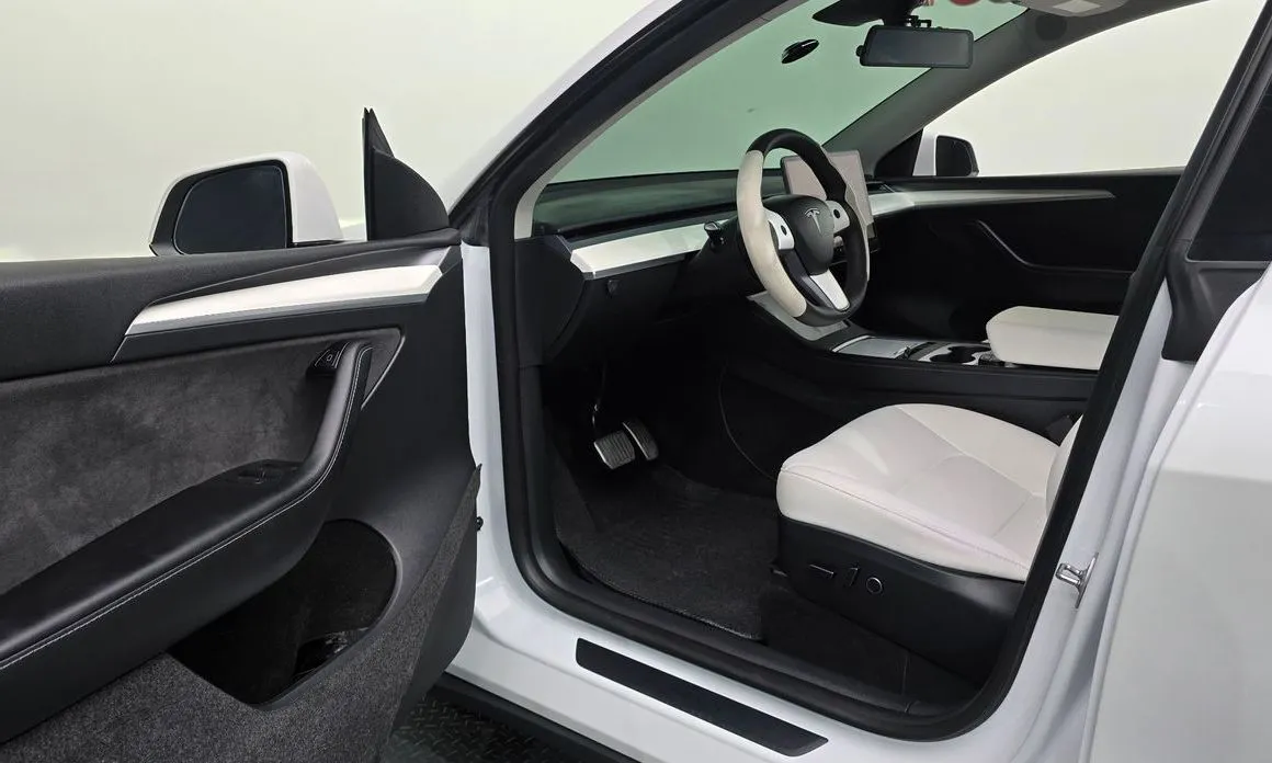 Tesla Model Y — фото 7