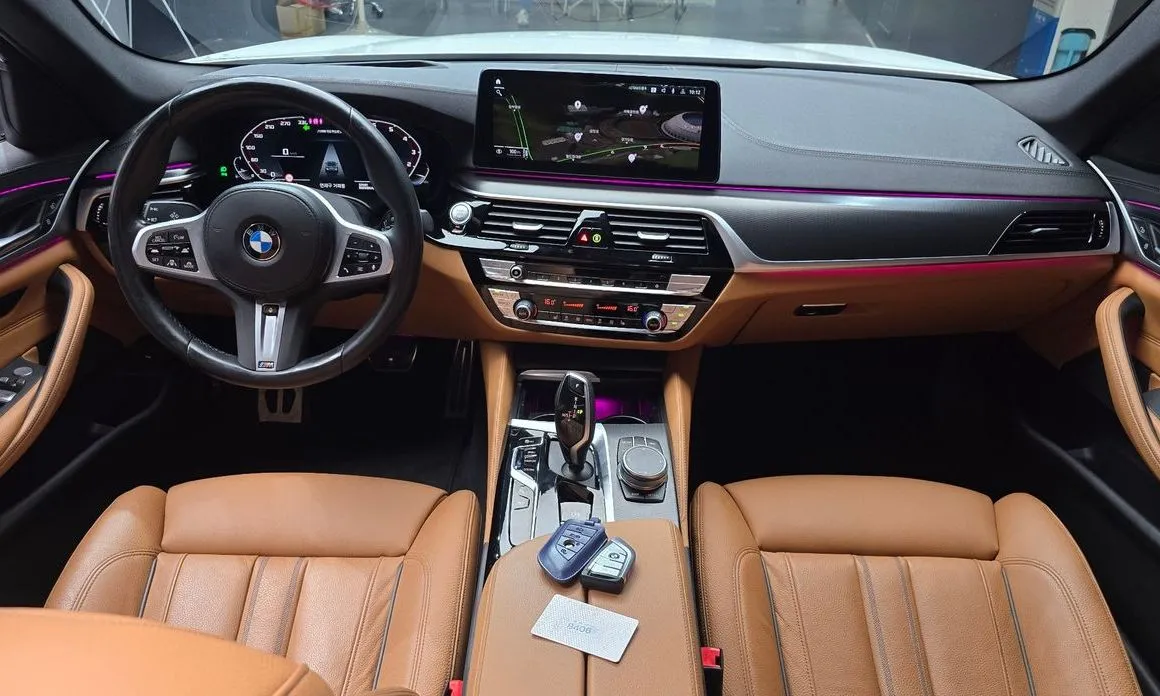 BMW 5-Series — фото 10