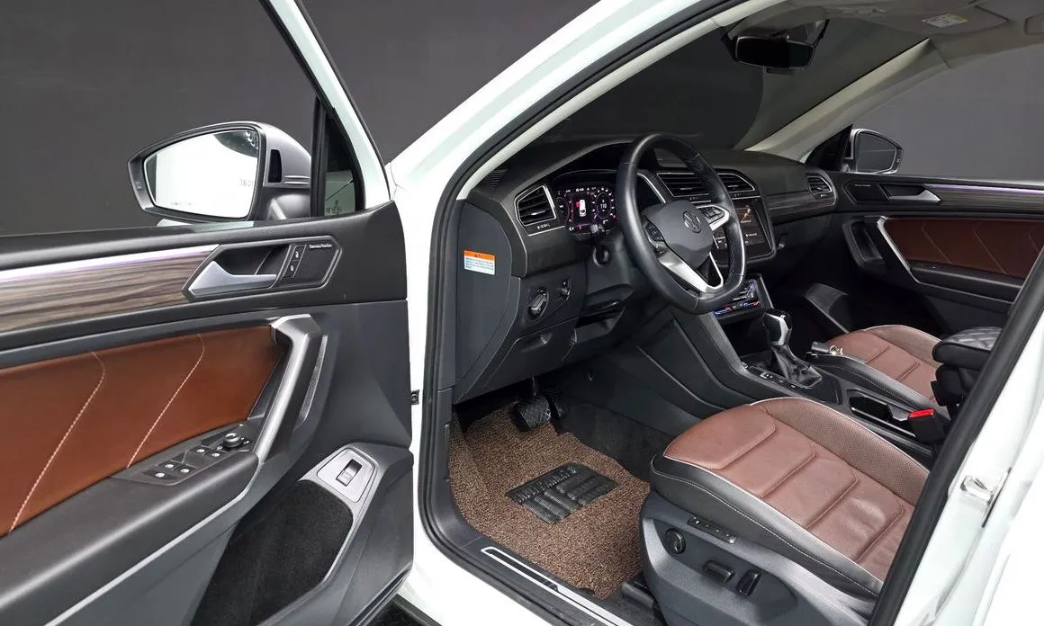 Volkswagen Tiguan — фото 10