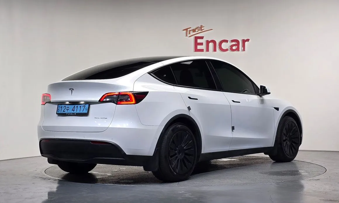 Tesla Model Y — фото 7