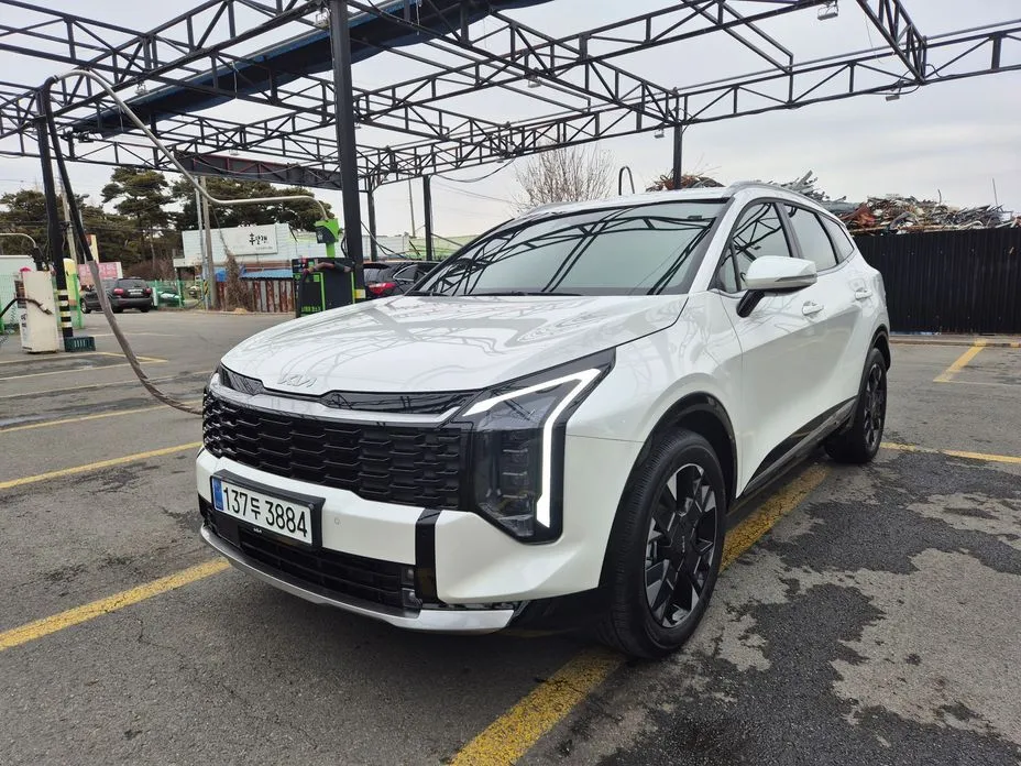 Kia Sportage — фото 1