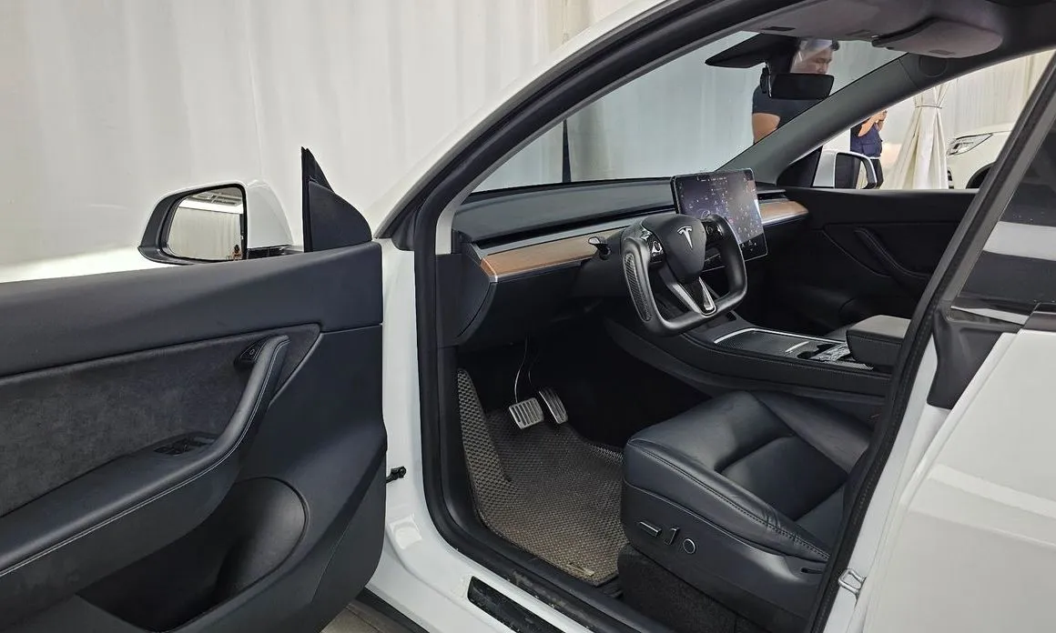 Tesla Model Y — фото 7