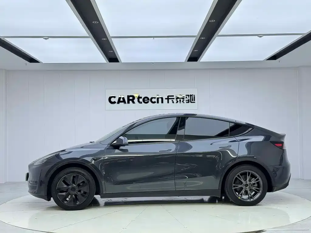 Tesla Model Y — фото 8