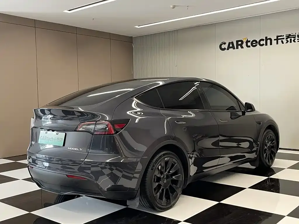 Tesla Model Y — фото 7