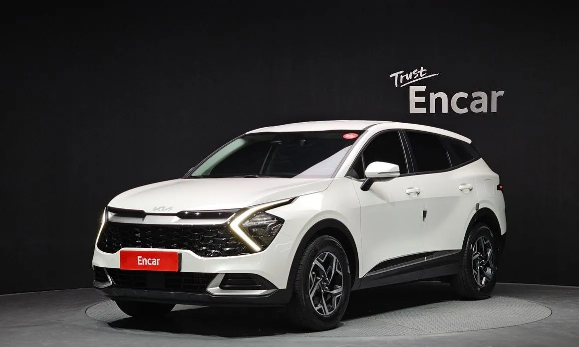 Kia Sportage — фото 1