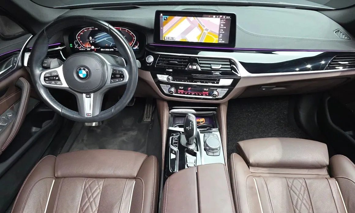 BMW 5-Series — фото 10