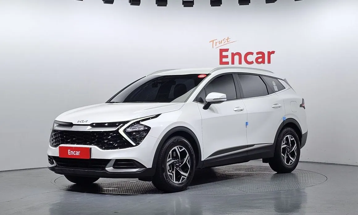 Kia Sportage — фото 1