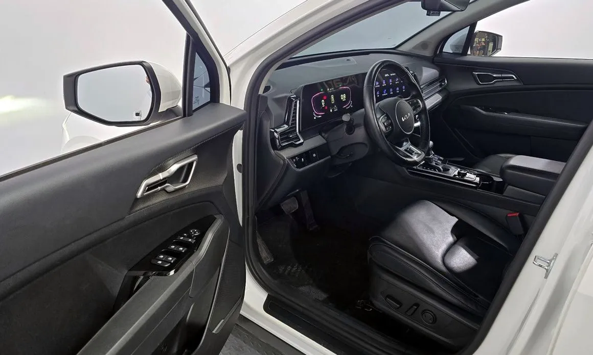 Kia Sportage — фото 8