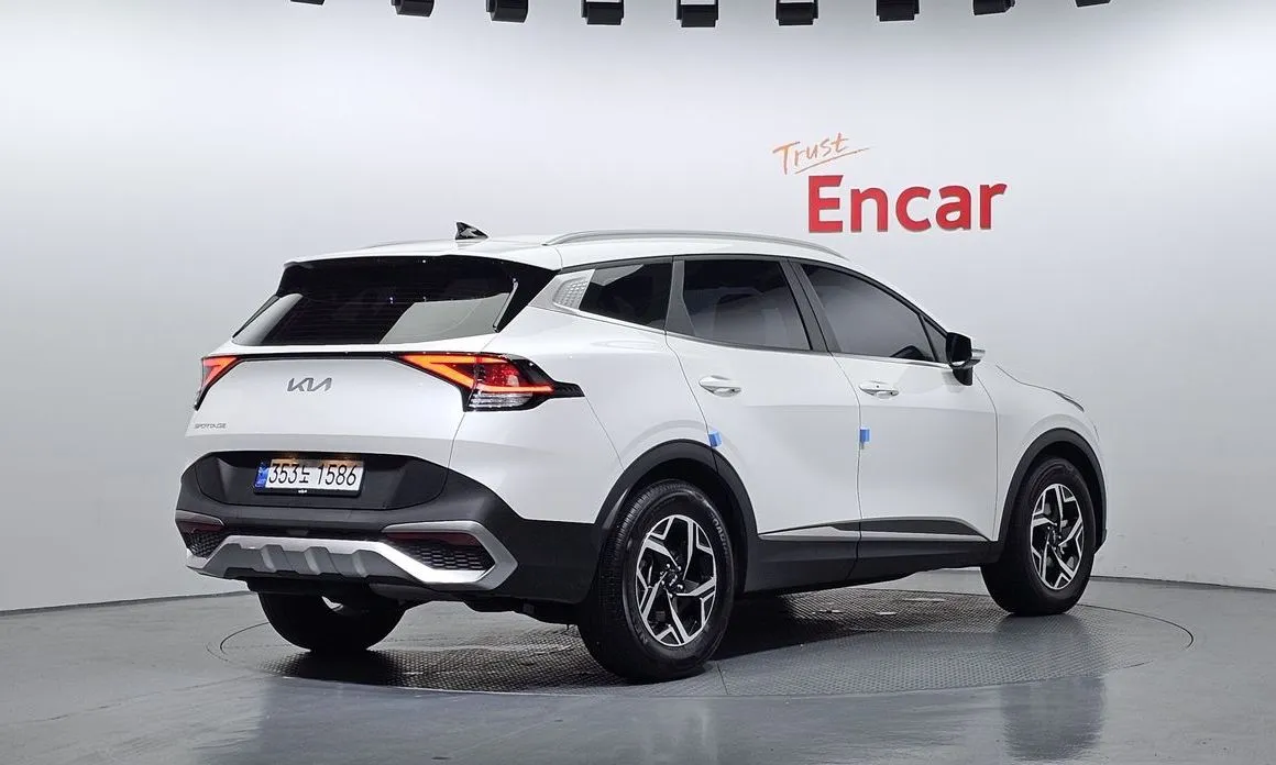 Kia Sportage — фото 6