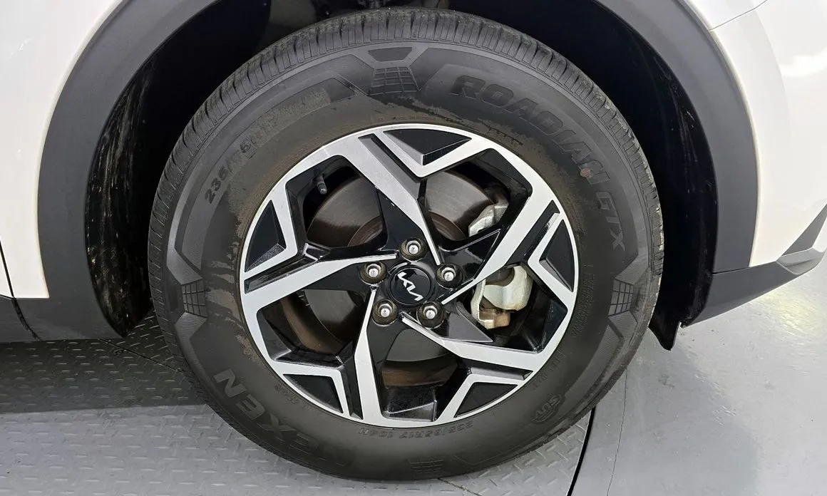 Kia Sportage — фото 10
