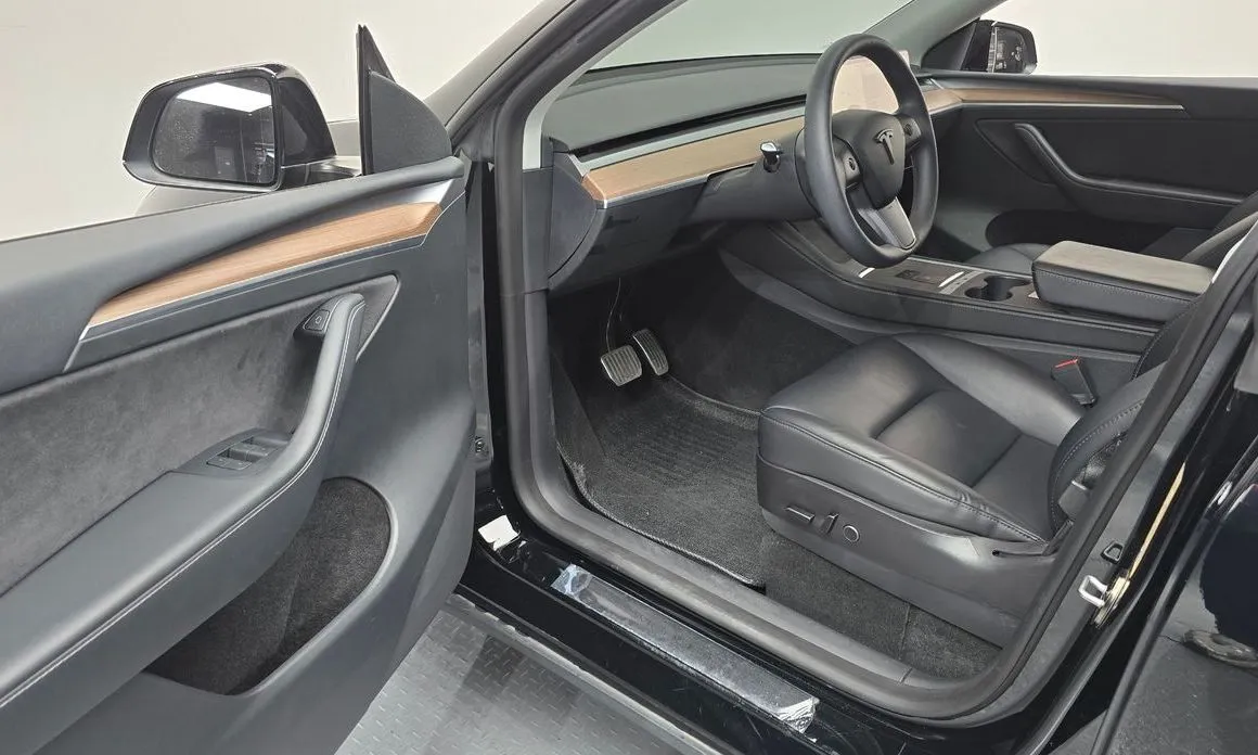 Tesla Model Y — фото 8