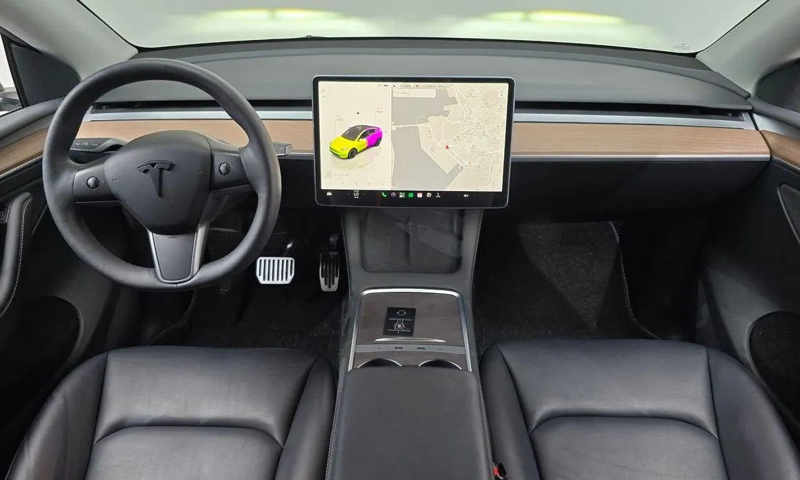 Tesla Model Y — фото 9