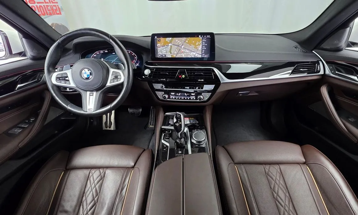 BMW 5-Series — фото 10