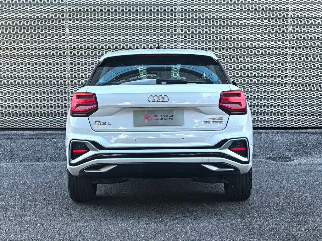 Audi Q2L — фото 6