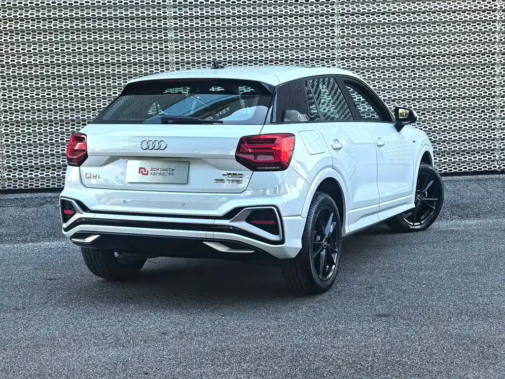 Audi Q2L — фото 7