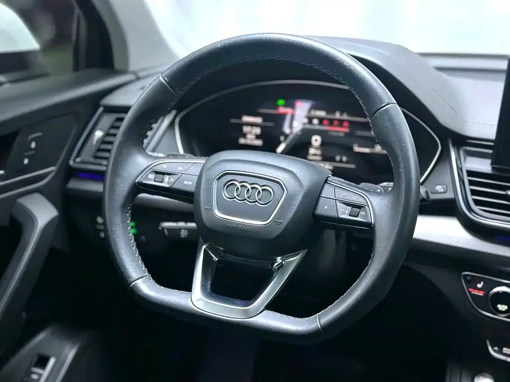 Audi Q5L — фото 7