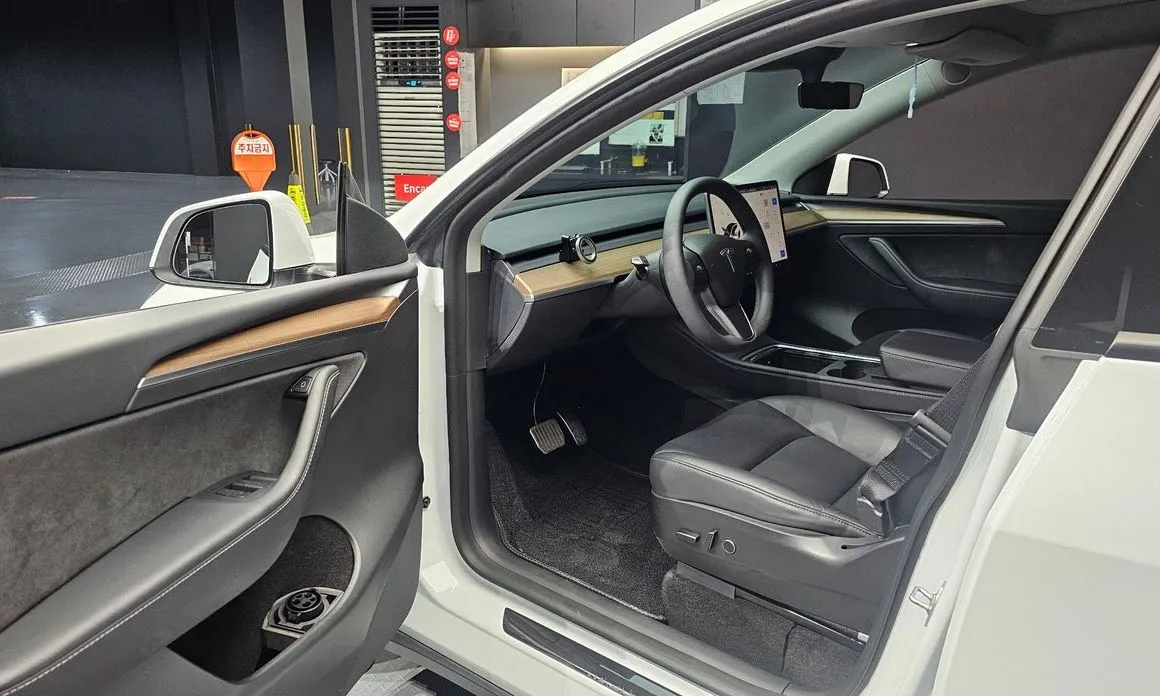 Tesla Model Y — фото 8