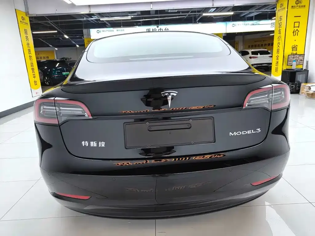 Tesla Model 3 — фото 7