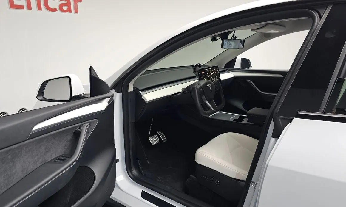 Tesla Model Y — фото 7