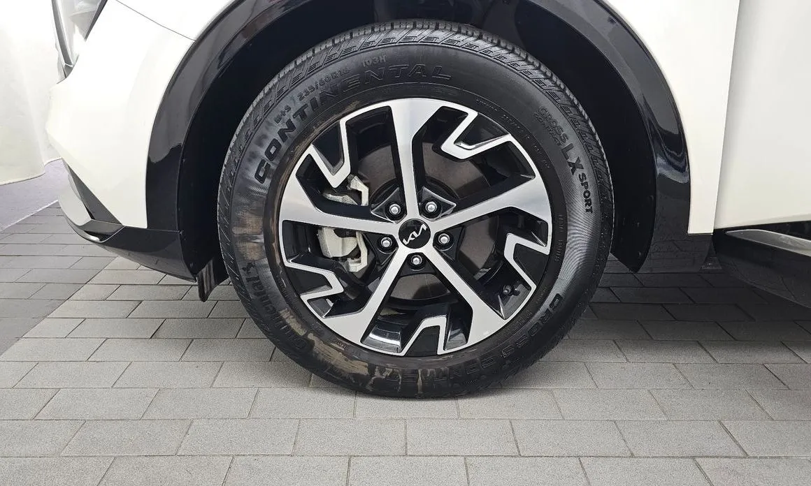 Kia Sportage — фото 10