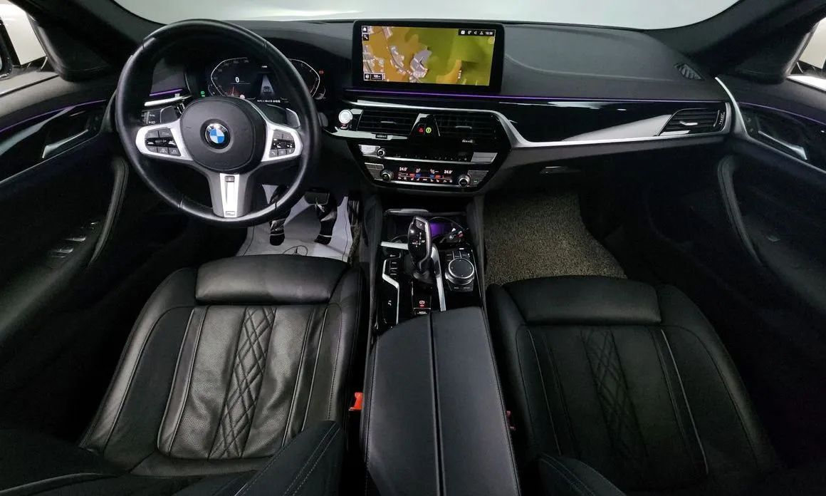 BMW 5-Series — фото 10
