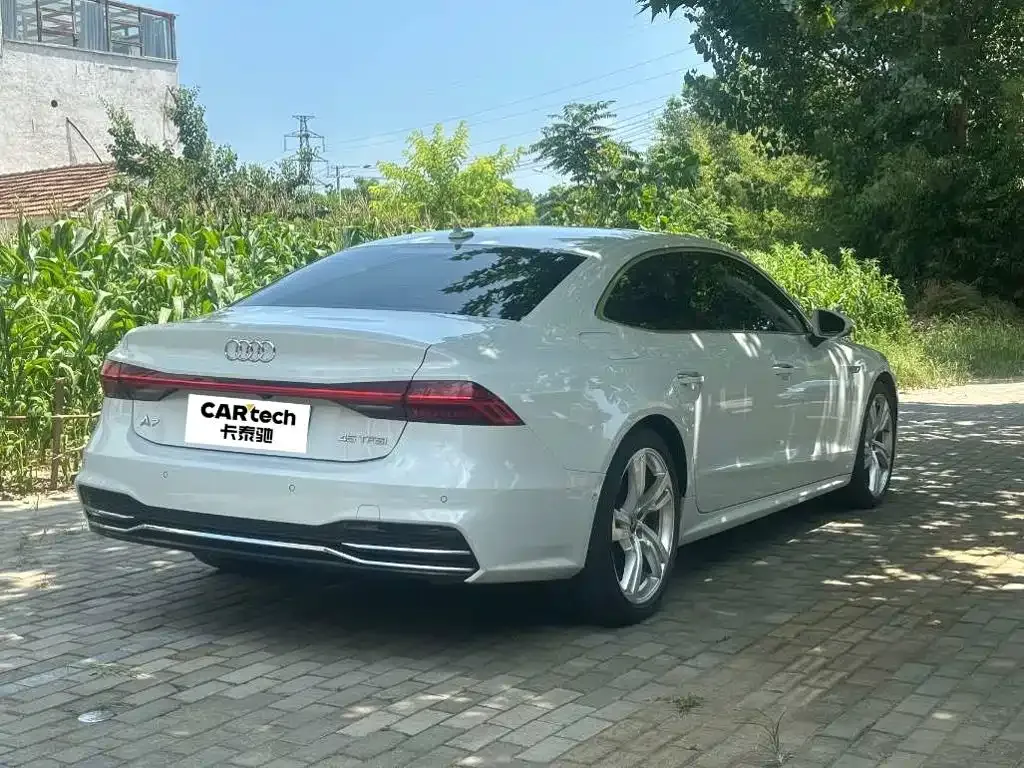 Audi A7L — фото 8
