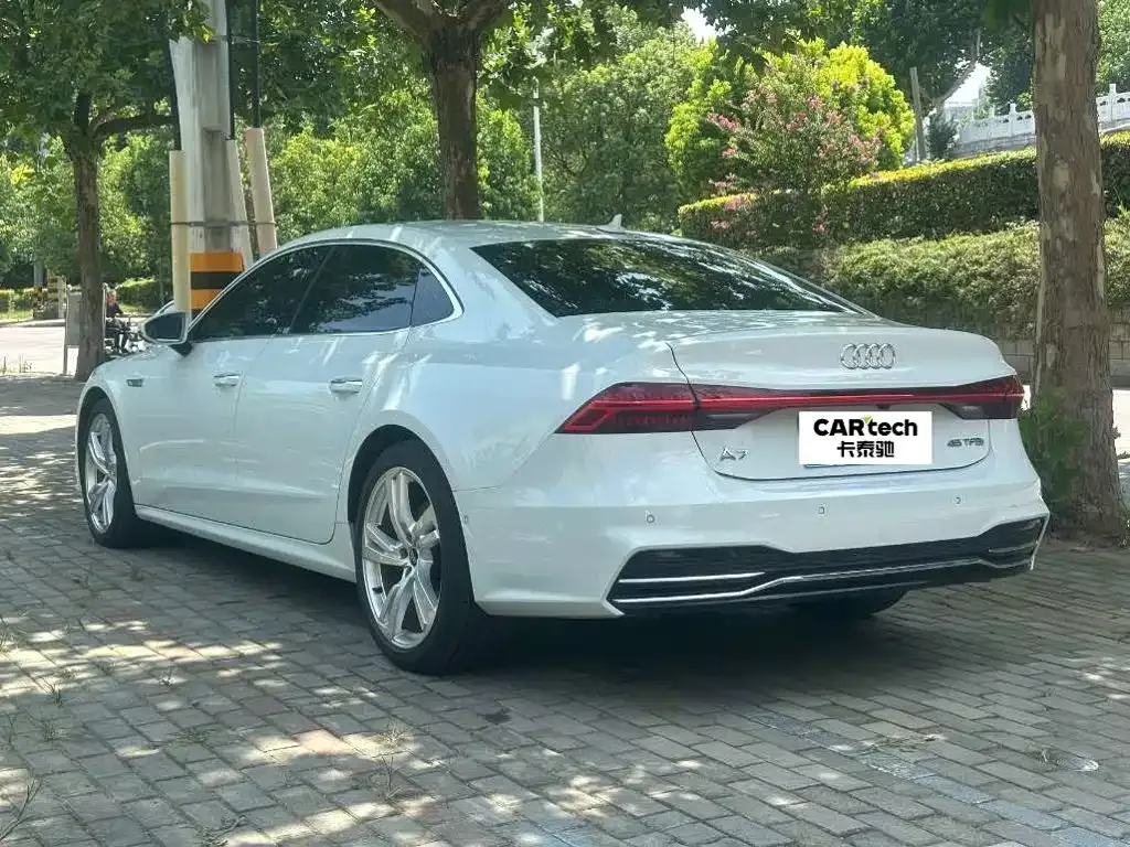 Audi A7L — фото 7