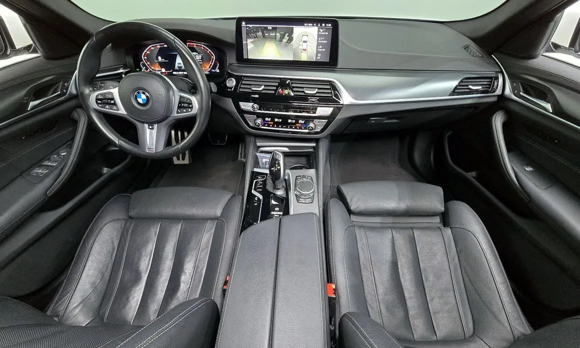 BMW 5-Series — фото 10