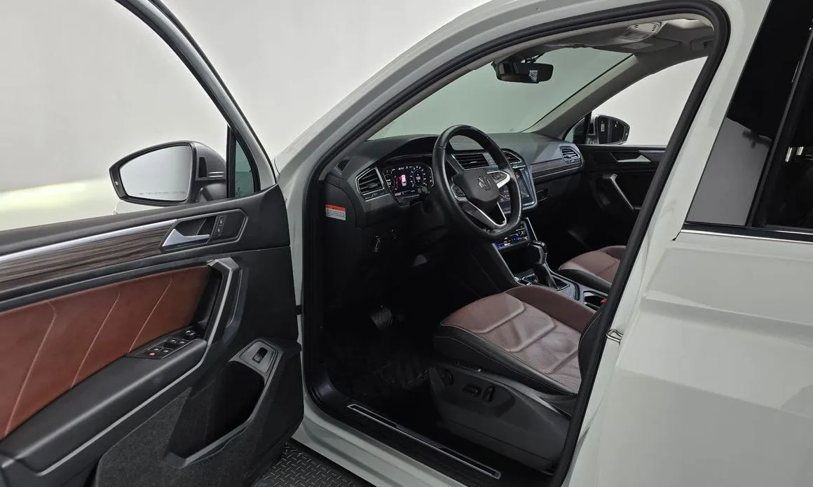 Volkswagen Tiguan — фото 7