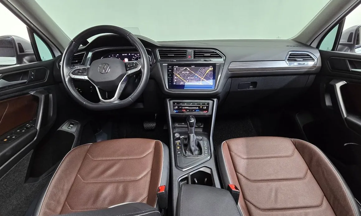 Volkswagen Tiguan — фото 8