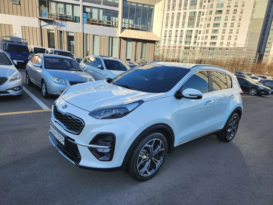 Kia Sportage — фото 9