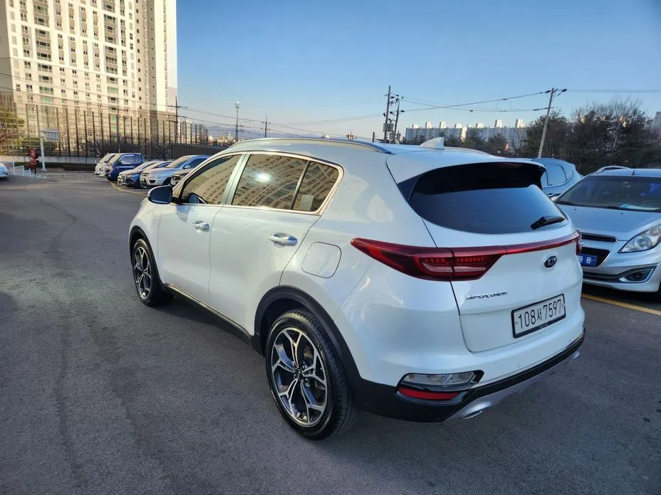 Kia Sportage — фото 7