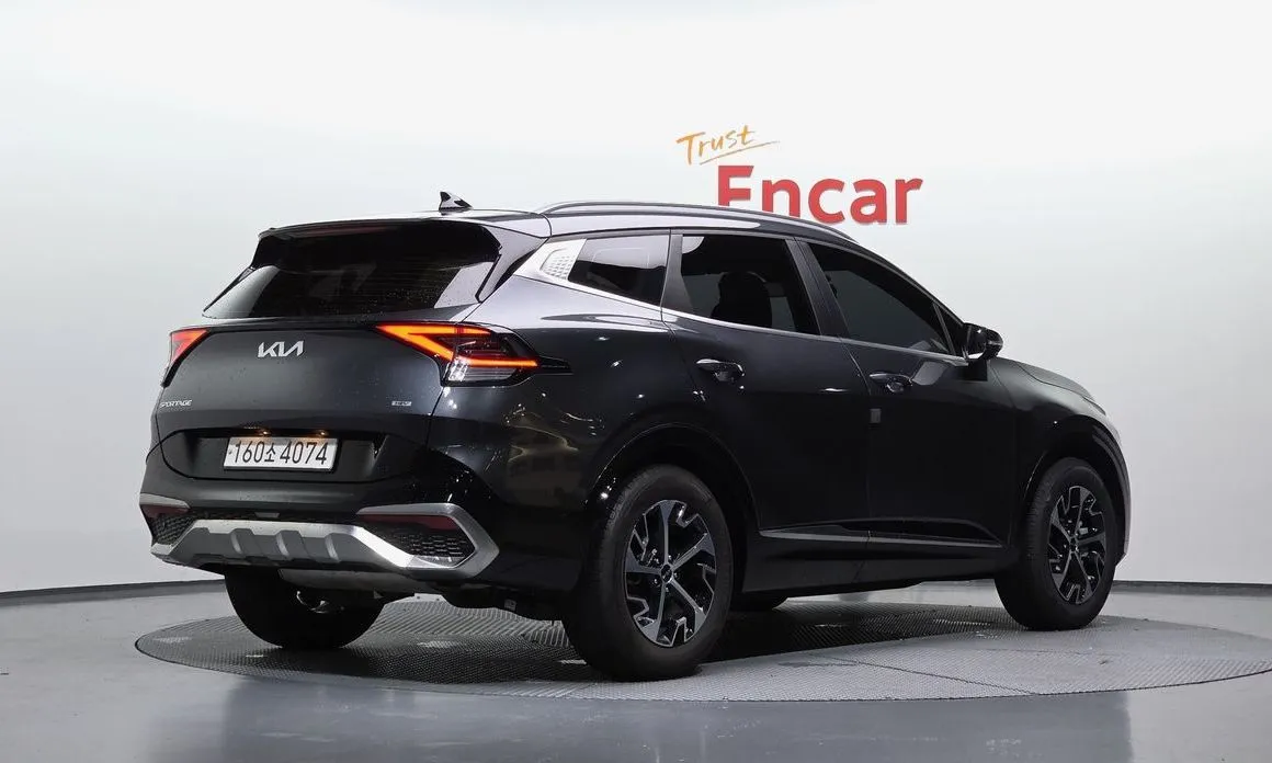Kia Sportage — фото 7