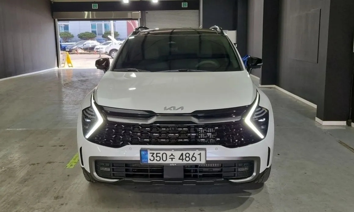 Kia Sportage — фото 1