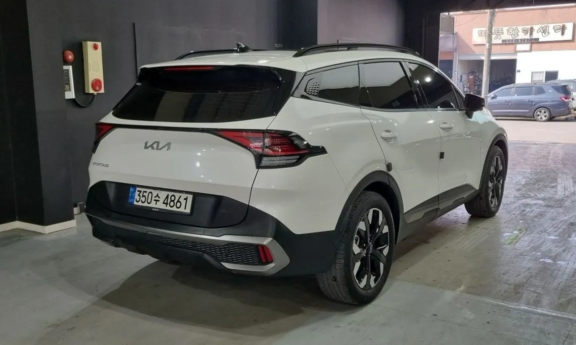 Kia Sportage — фото 10