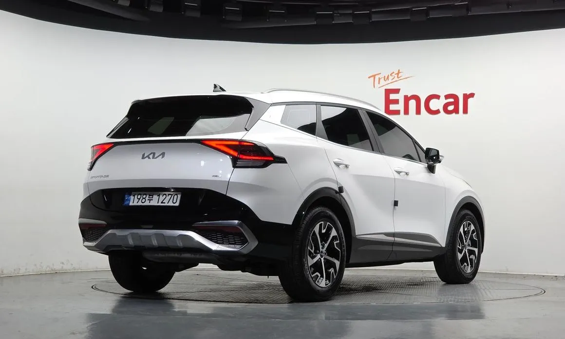 Kia Sportage — фото 8