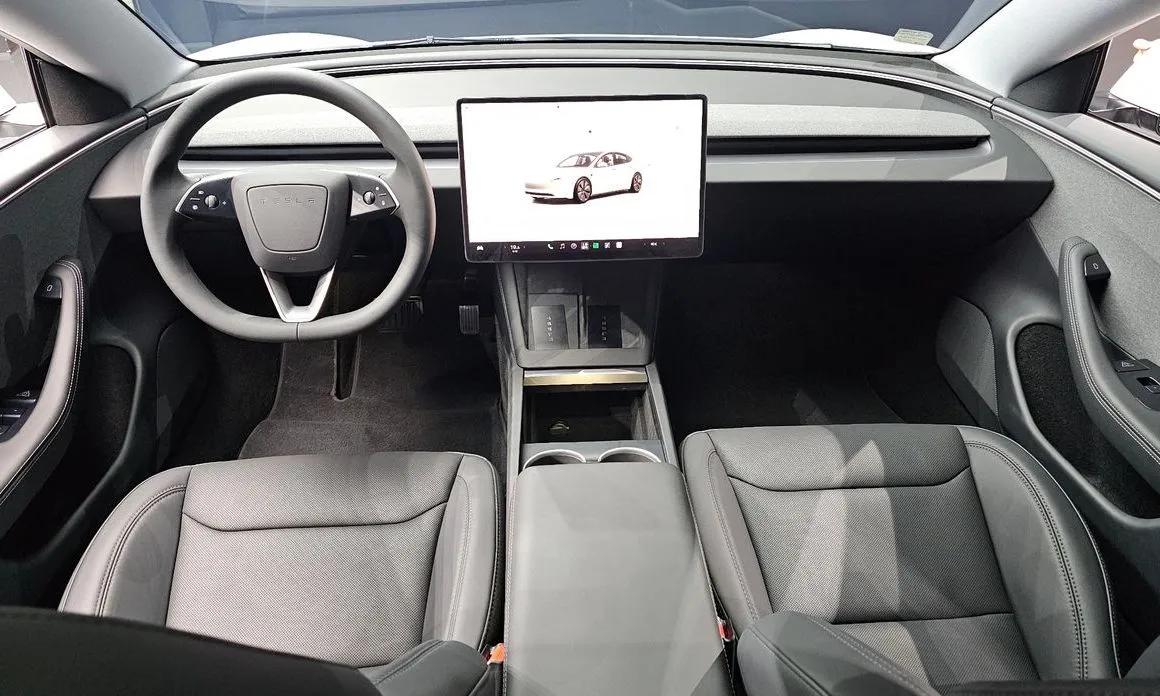 Tesla Model 3 — фото 10