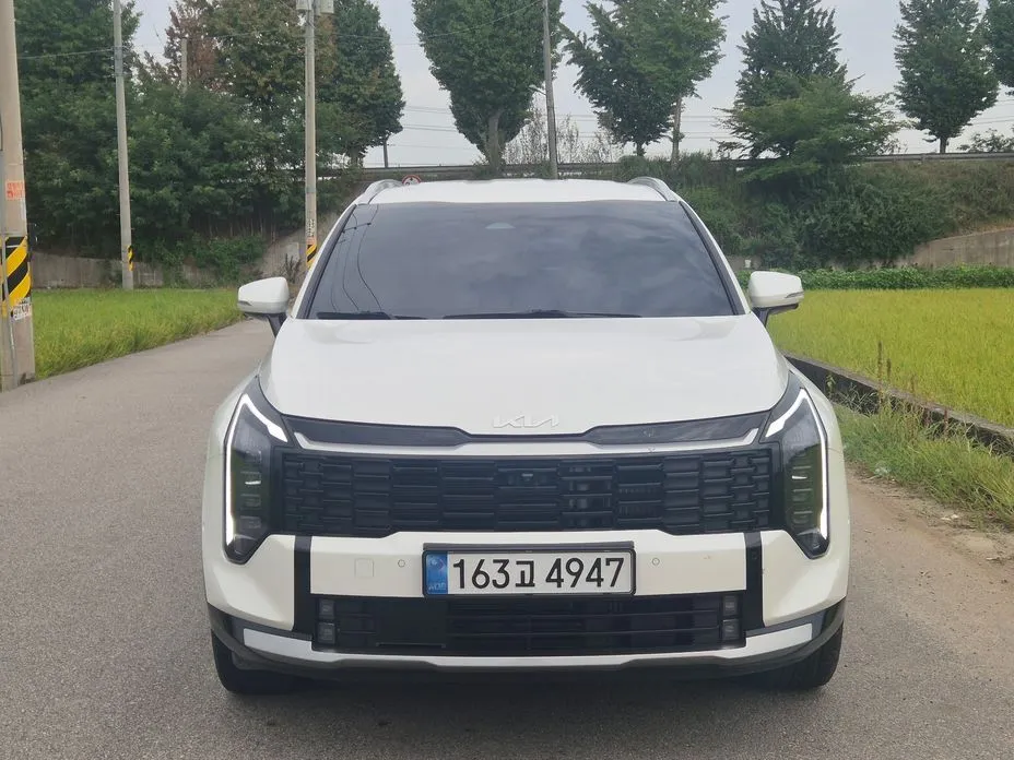 Kia Sportage — фото 1