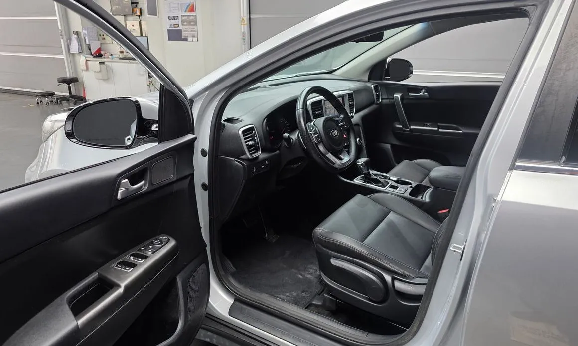 Kia Sportage — фото 9