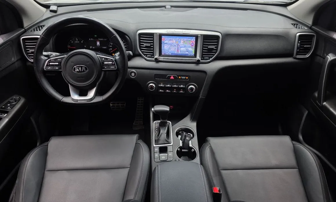 Kia Sportage — фото 6