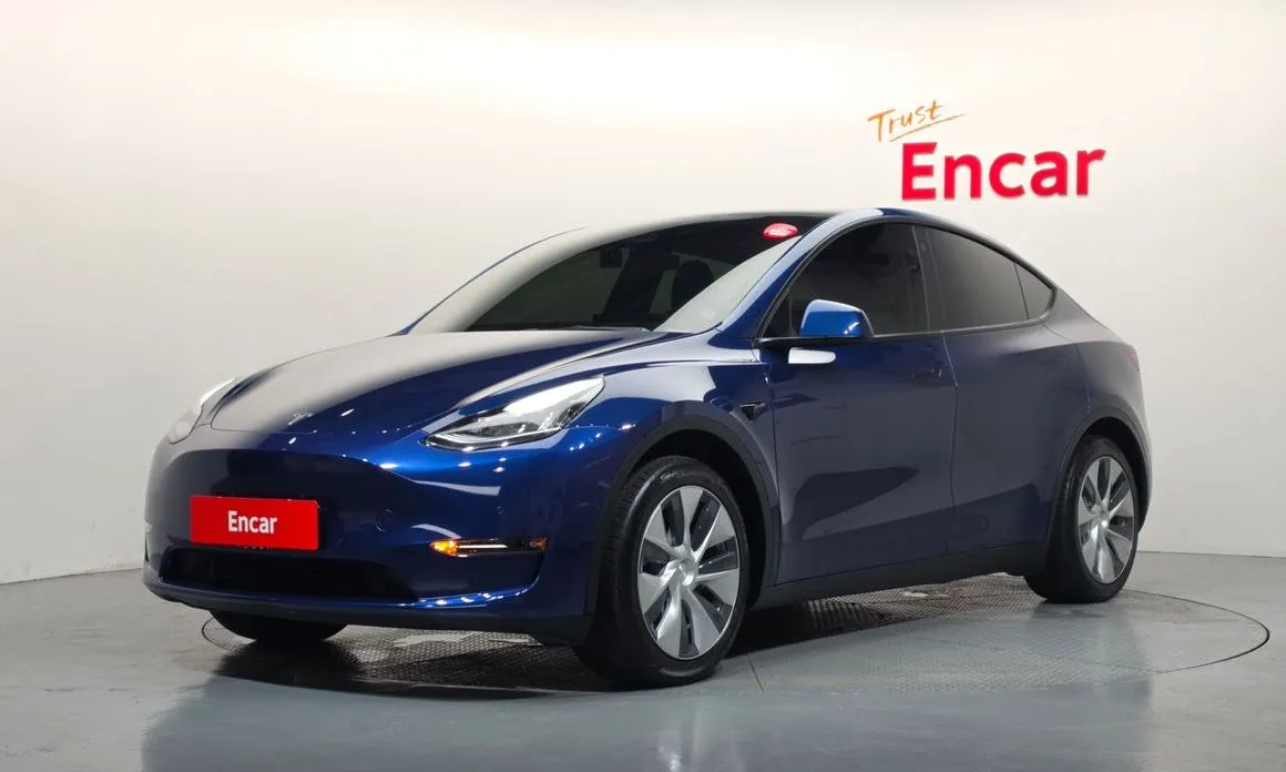 Tesla Model Y — фото 1