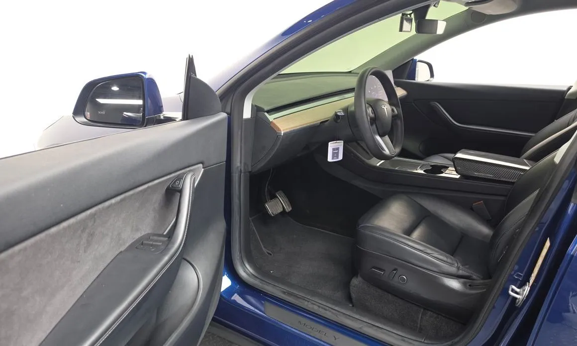 Tesla Model Y — фото 6