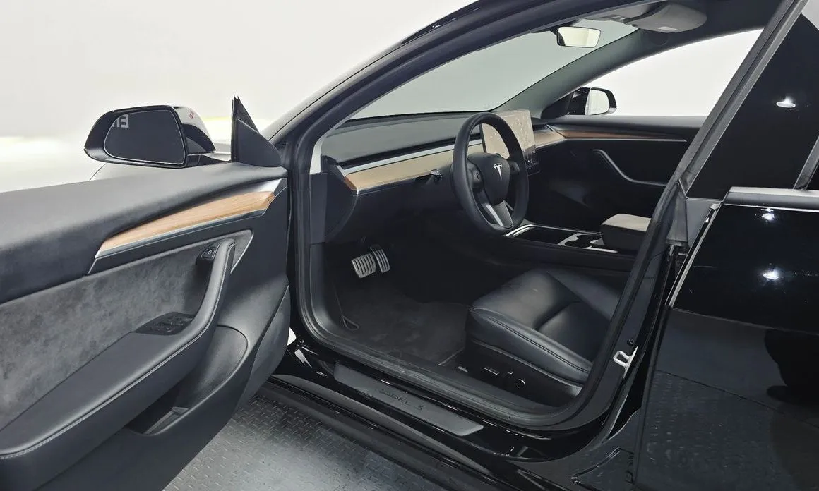 Tesla Model 3 — фото 9