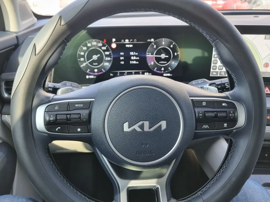 Kia Sportage — фото 10