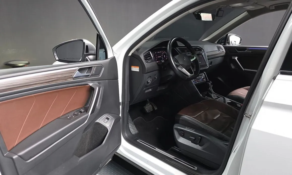 Volkswagen Tiguan — фото 9