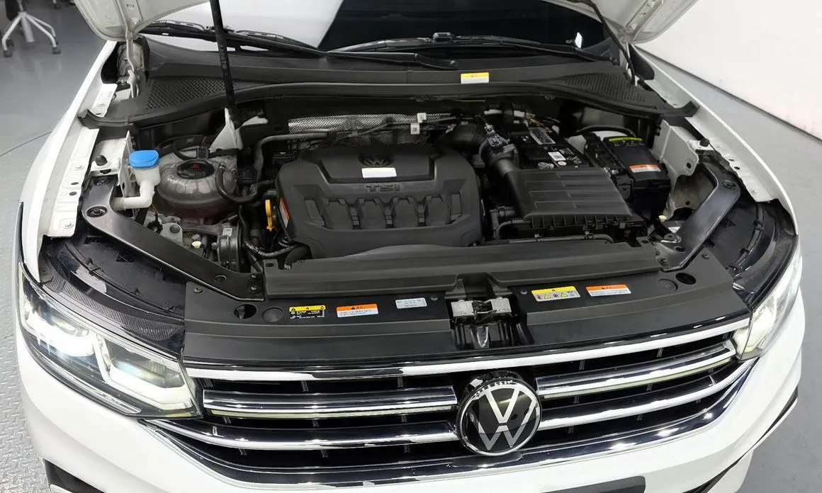 Volkswagen Tiguan — фото 10